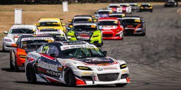 Mazda RX8 field racing on track