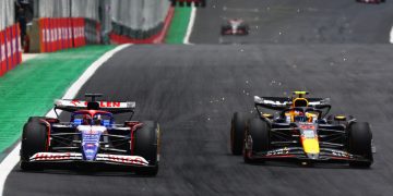 SAO PAULO, BRAZIL - NOVEMBER 02: Liam Lawson of New Zealand driving the (30) Visa Cash App RB VCARB 01 and Sergio Perez of Mexico driving the (11) Oracle Red Bull Racing RB20 battle for track position during the Sprint ahead of the F1 Grand Prix of Brazil at Autodromo Jose Carlos Pace on November 02, 2024 in Sao Paulo, Brazil. (Photo by Mark Thompson/Getty Images) // Getty Images / Red Bull Content Pool // SI202411020300 // Usage for editorial use only //