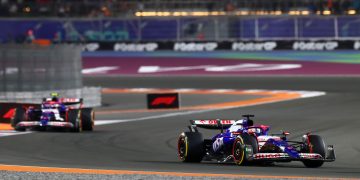 LUSAIL CITY, QATAR - NOVEMBER 30: Liam Lawson of New Zealand driving the (30) Visa Cash App RB VCARB 01 leads Yuki Tsunoda of Japan driving the (22) Visa Cash App RB VCARB 01 on track during the Sprint ahead of the F1 Grand Prix of Qatar at Lusail International Circuit on November 30, 2024 in Lusail City, Qatar. (Photo by Peter Fox/Getty Images) // Getty Images / Red Bull Content Pool // SI202411300302 // Usage for editorial use only //